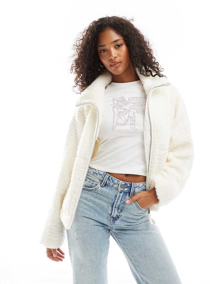 Threadbare - Teddyfell-Jacke in Weiß mit Reißverschluss Threadbare - Teddyfell-Jacke in Weiß mit Reißverschluss von Threadbare