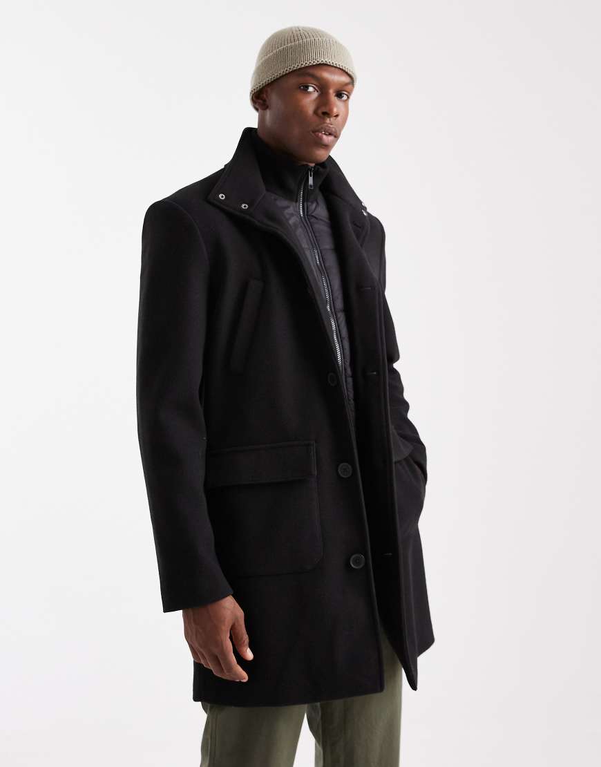 Threadbare - Windjacke in Schwarz mit hohem Kragen, Kapuze und Knopfleiste von Threadbare