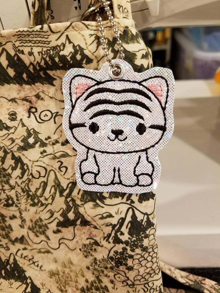 Kleiner Tiger Anhänger von TigerInATornado