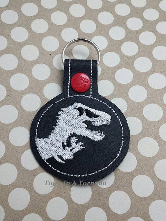 T-Rex Dinosaurier Snap Tab Schlüsselanhänger von TigerInATornado