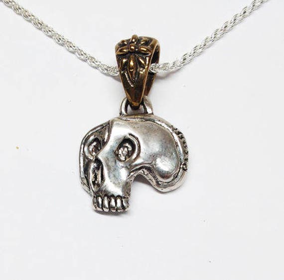 Schädel Picasso Silberanhänger V2 Schädel Picasso Silberanhänger V2 von TigraniSilver