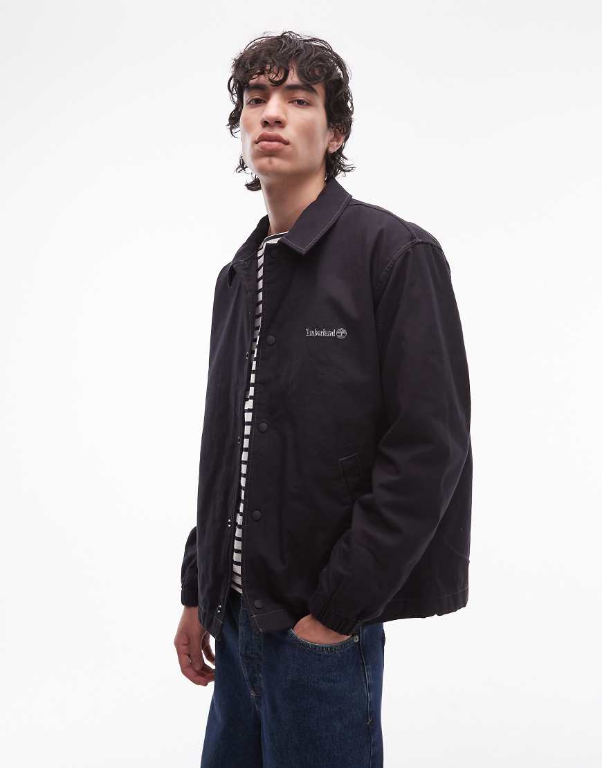 Timberland - Gefütterte Coachjacke aus gewaschenem Canvas in Schwarz von Timberland