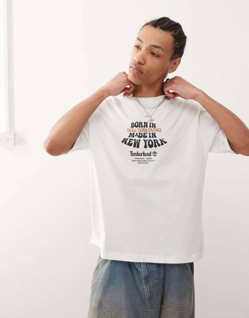 Timberland - Oversize-T-Shirt in Weiß mit „Born In"-Grafikprint von Timberland
