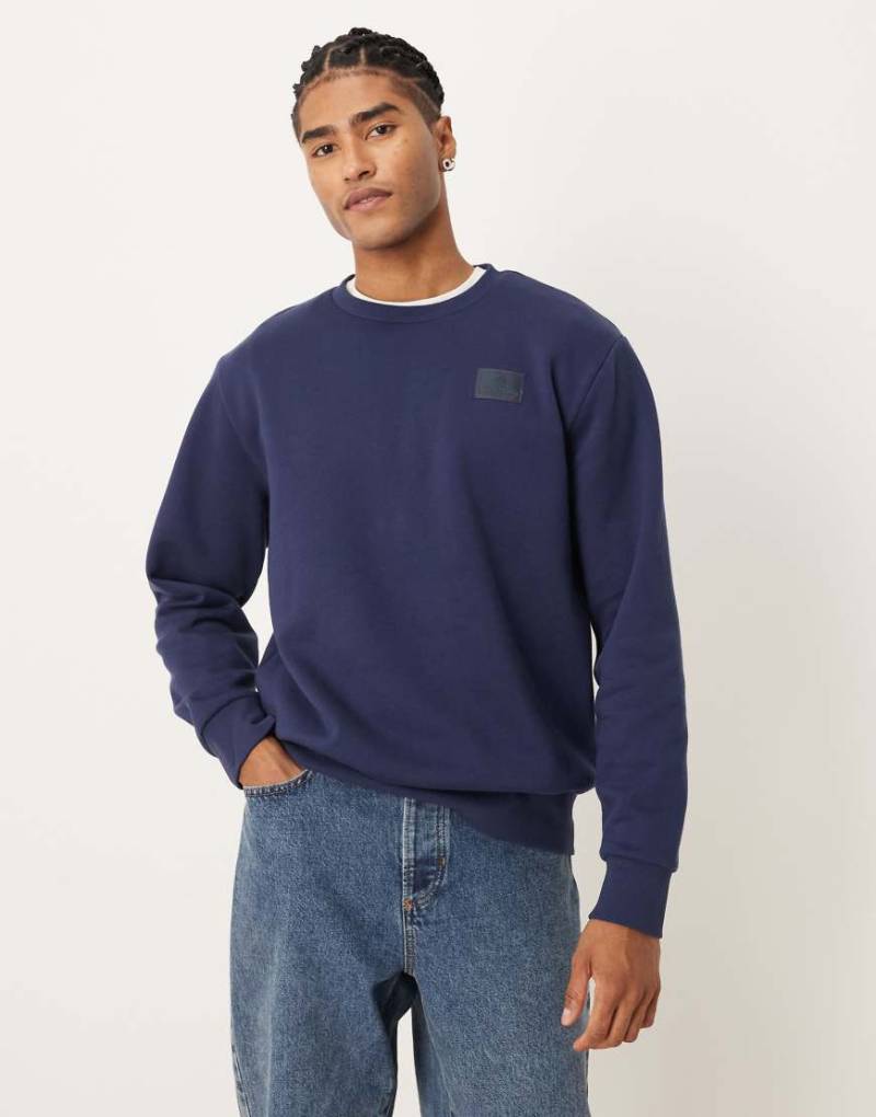 Timberland - Sweatshirt in Caban-Blau mit Silikon-Aufnäher und Rundhalsausschnitt-Marineblau von Timberland