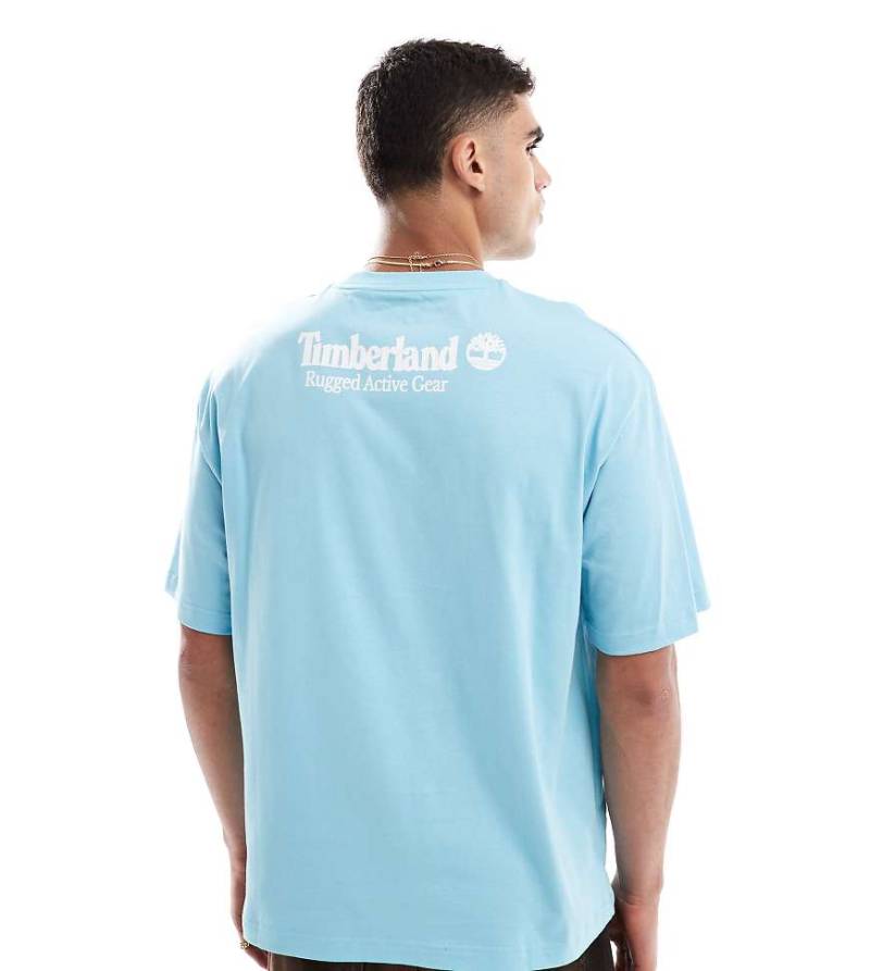 Timberland - T-Shirt in Blau mit „Rugged"-Rückenprint, exklusiv bei ASOS von Timberland