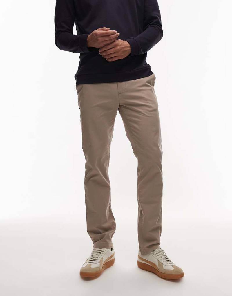 Tommy Hilfiger - 1985 - Denton - Chinohose in Beige mit geradem Schnitt-Neutral Tommy Hilfiger - 1985 - Denton - Chinohose in Beige mit geradem Schnitt-Neutral von Tommy Hilfiger