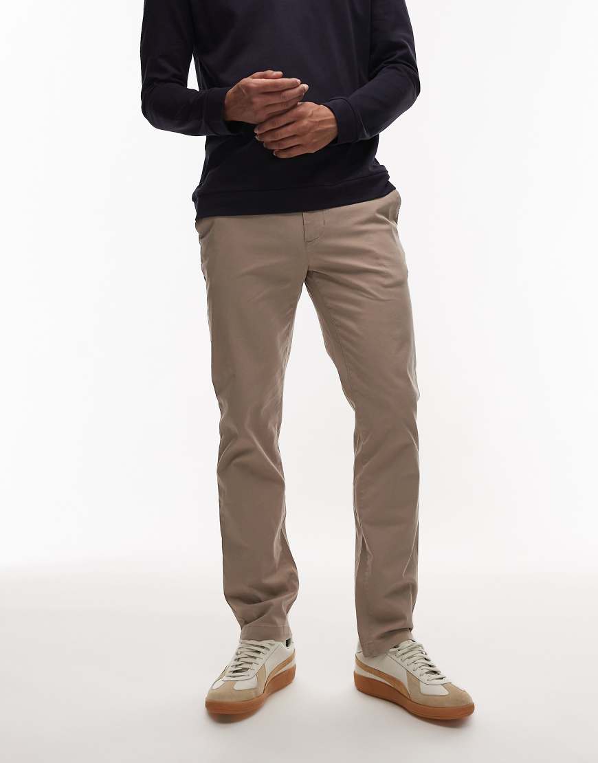 Tommy Hilfiger - 1985 - Denton - Chinohose in Beige mit geradem Schnitt-Neutral Tommy Hilfiger - 1985 - Denton - Chinohose in Beige mit geradem Schnitt-Neutral von Tommy Hilfiger