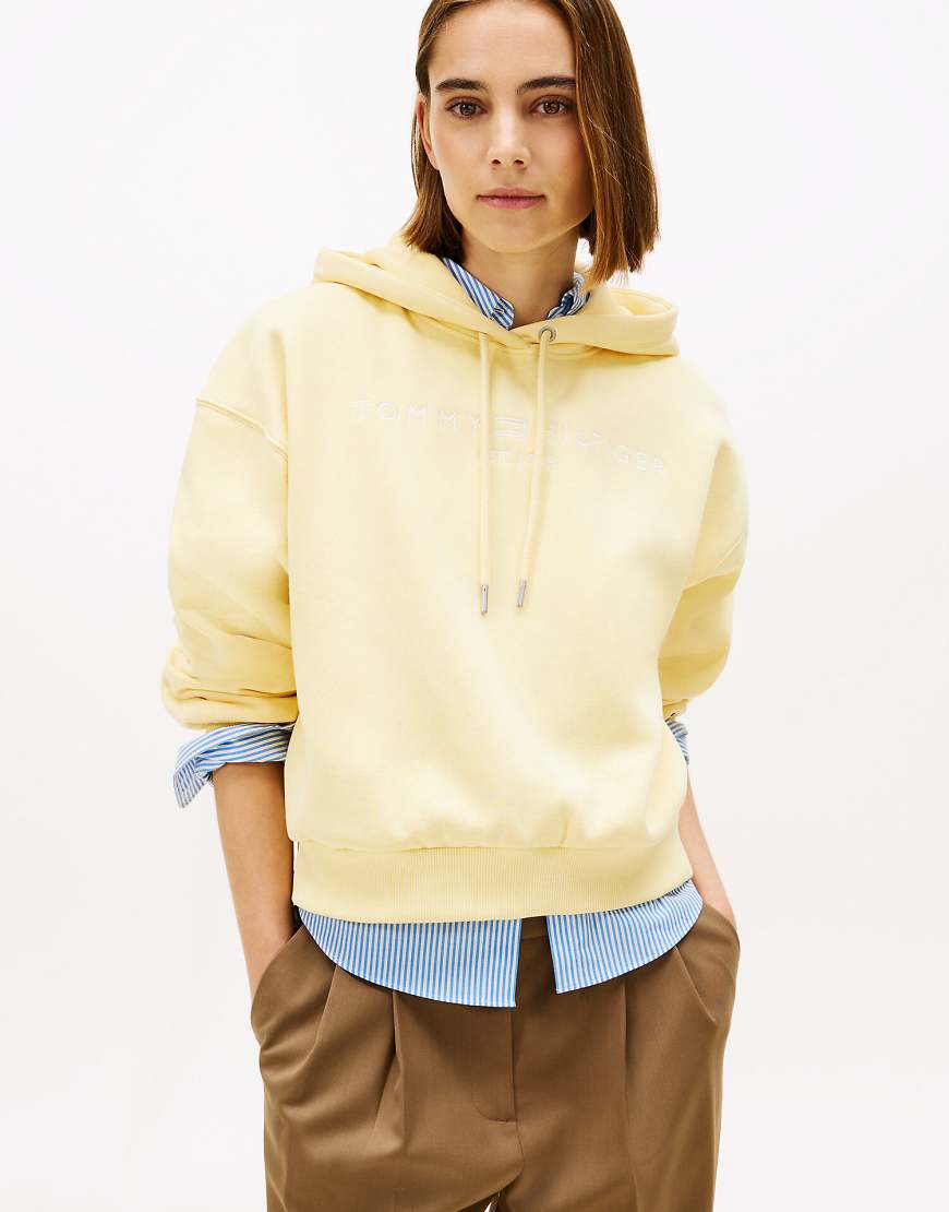 Tommy Hilfiger - Flex - Locker geschnittener Fleece-Kapuzenpullover in Hellgelb mit Logo-Stickerei von Tommy Hilfiger