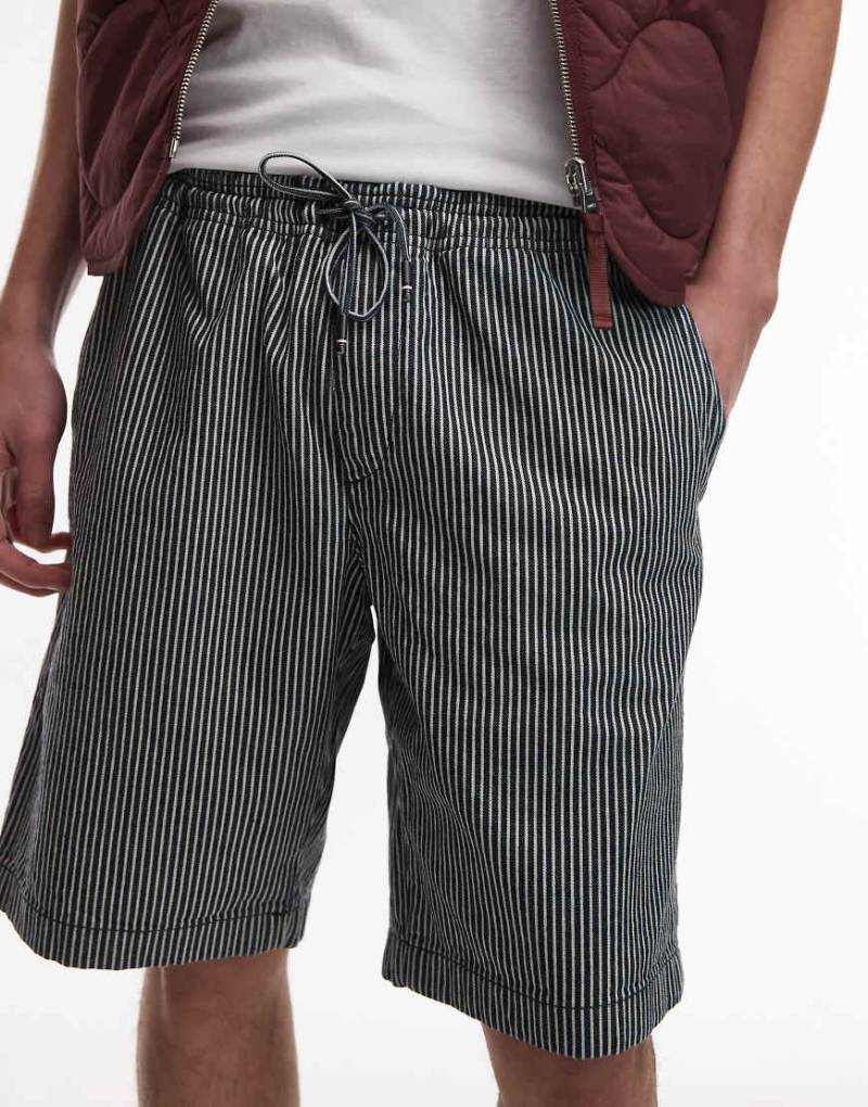 Tommy Hilfiger - Harlem - Bunte Shorts mit lockerem Schnitt und Streifen-Blau Tommy Hilfiger - Harlem - Bunte Shorts mit lockerem Schnitt und Streifen-Blau von Tommy Hilfiger