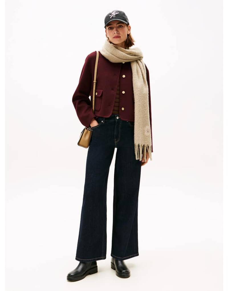 Tommy Hilfiger - Jeans in Dunkelblau im 70er-Style mit hohem Bund und weitem Bein Tommy Hilfiger - Jeans in Dunkelblau im 70er-Style mit hohem Bund und weitem Bein von Tommy Hilfiger