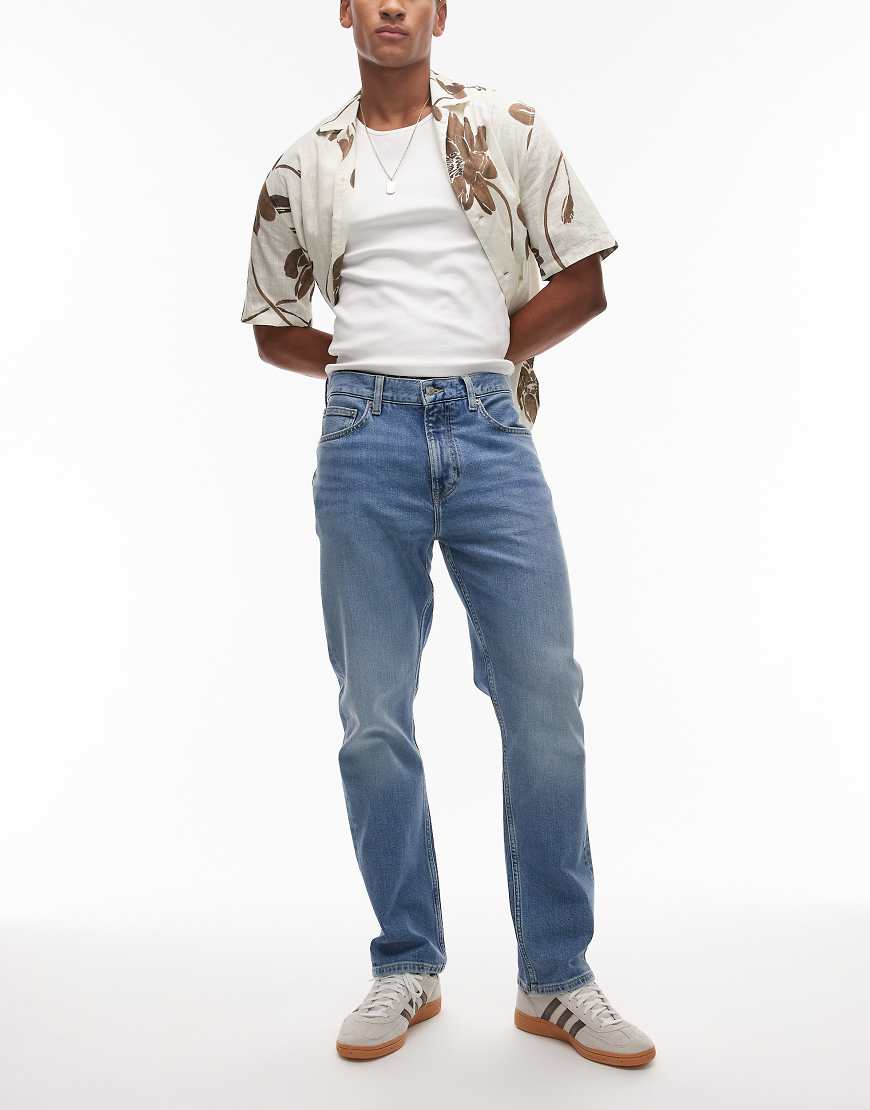 Tommy Hilfiger - Mercer - Jeans in verblasstem Dunkelblau mit regulärem, geradem Schnitt von Tommy Hilfiger