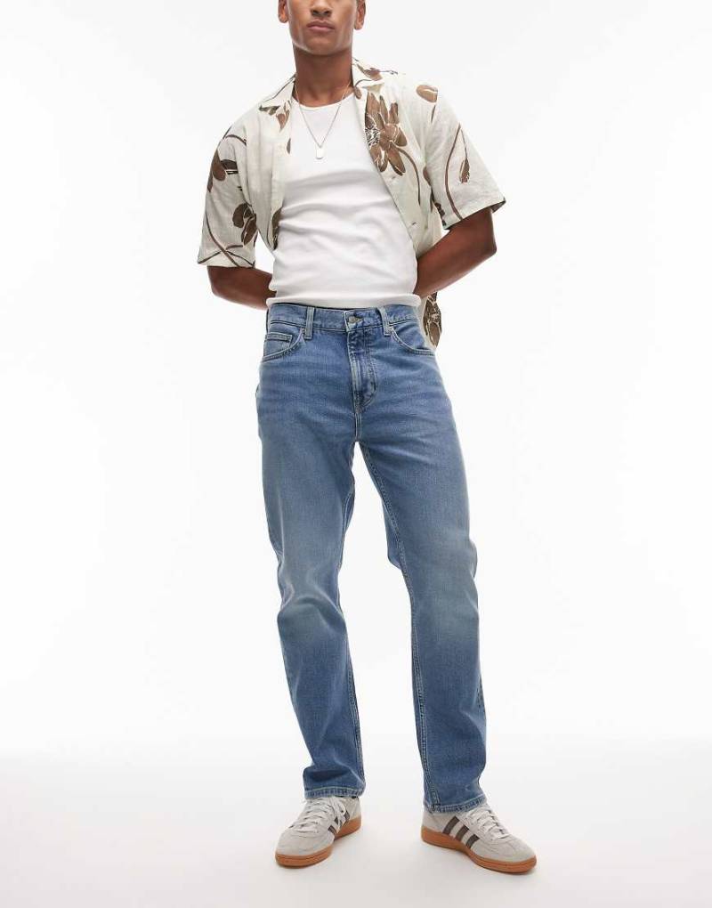 Tommy Hilfiger - Mercer - Jeans in verblasstem Dunkelblau mit regulärem, geradem Schnitt von Tommy Hilfiger