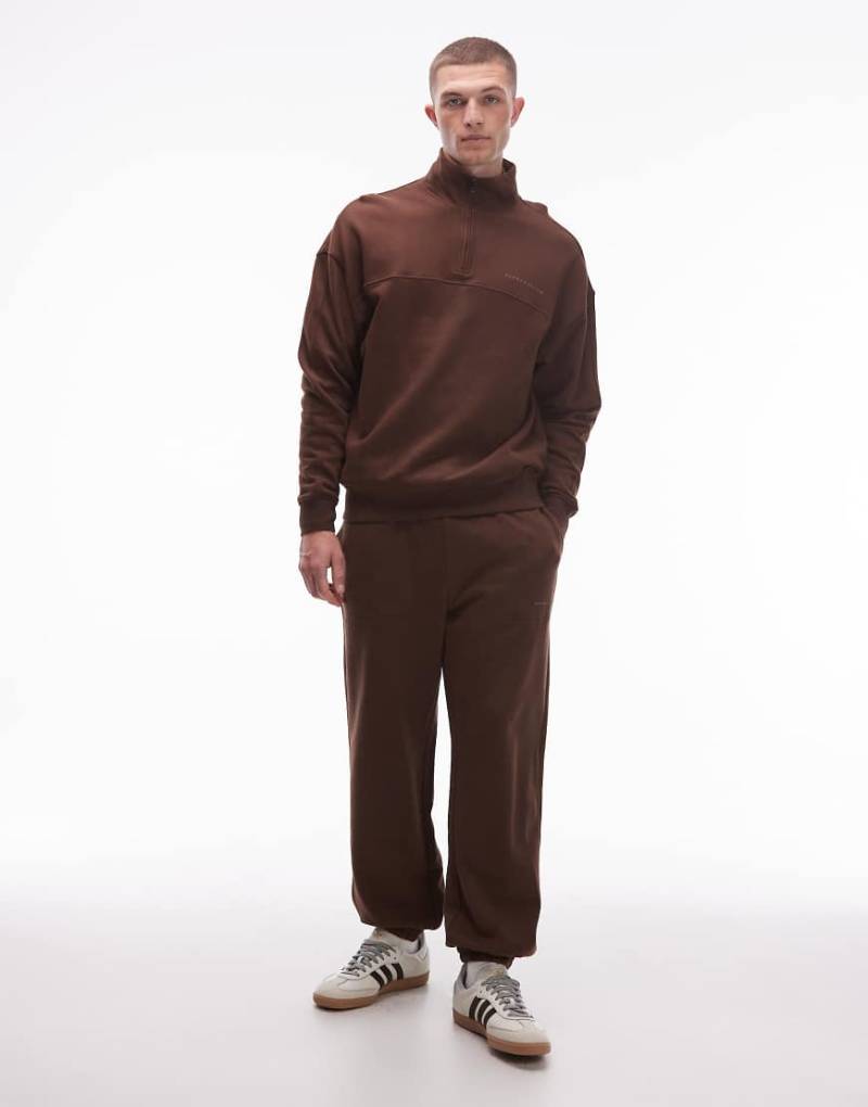 Tommy Hilfiger - Oversize-Jogginghose in Braun mit Logo-Brown von Tommy Hilfiger