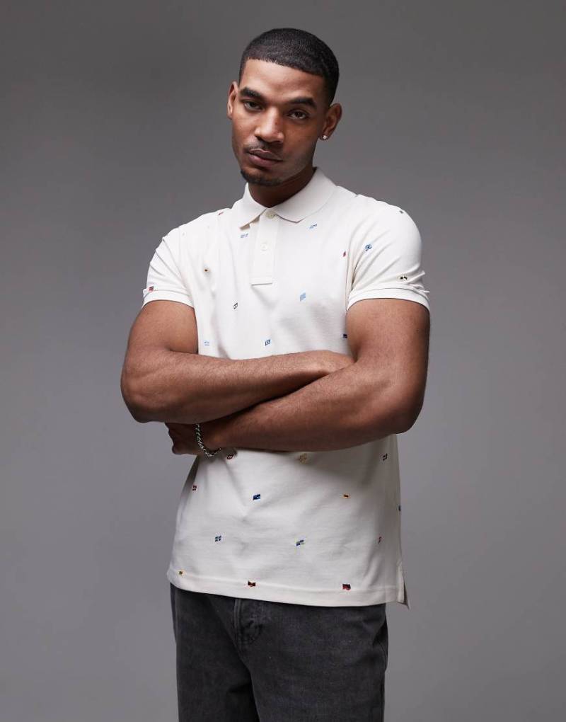 Tommy Hilfiger - Polohemd in Wollweiß mit All-over-Flaggenprint von Tommy Hilfiger