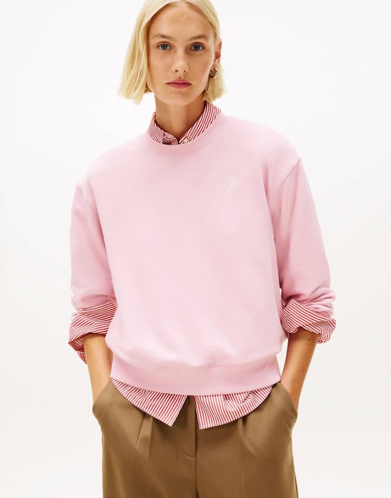 Tommy Hilfiger - Terry-Sweatshirt in Hellrosa mit Logostickerei von Tommy Hilfiger