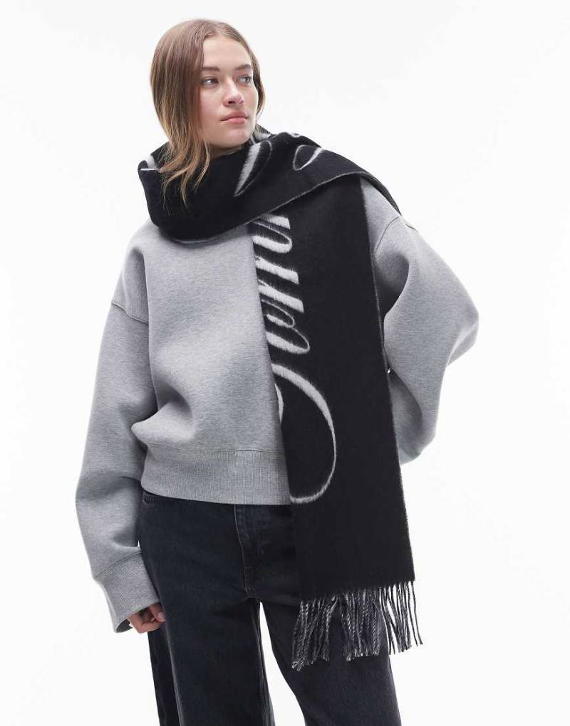 Tommy Hilfiger - Schal in Schwarz mit Logo-Schriftzug von Tommy Jeans