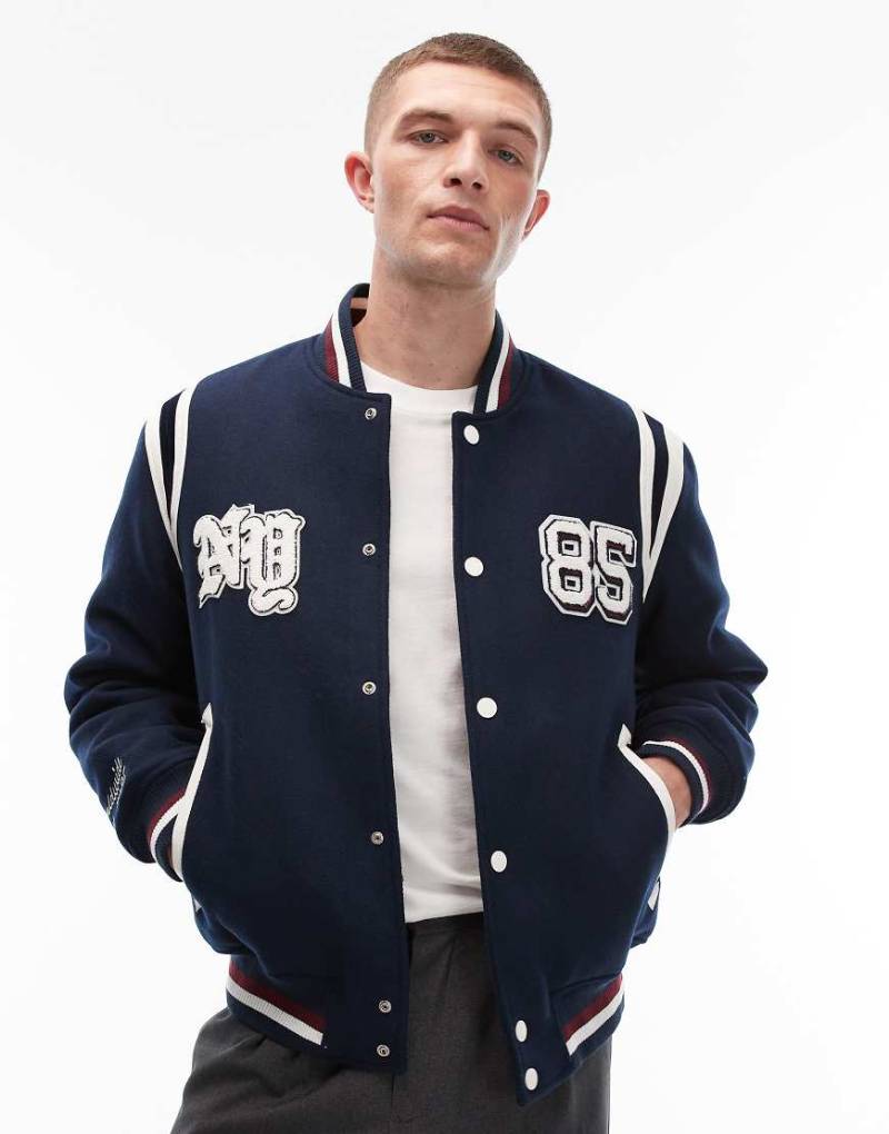 Tommy Jeans - College-Jacke in Marineblau mit „NY"-Logo von Tommy Jeans