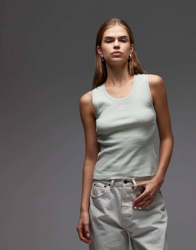 Tommy Jeans - Geripptes Tanktop in Grün mit Logo-Schriftzug-Brown von Tommy Jeans