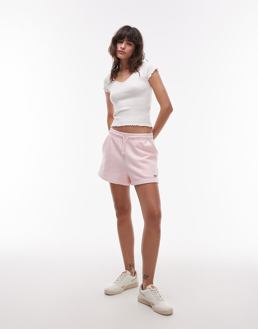 Tommy Jeans - Jersey-Shorts in Babyrosa mit Schriftzug-Logo von Tommy Jeans