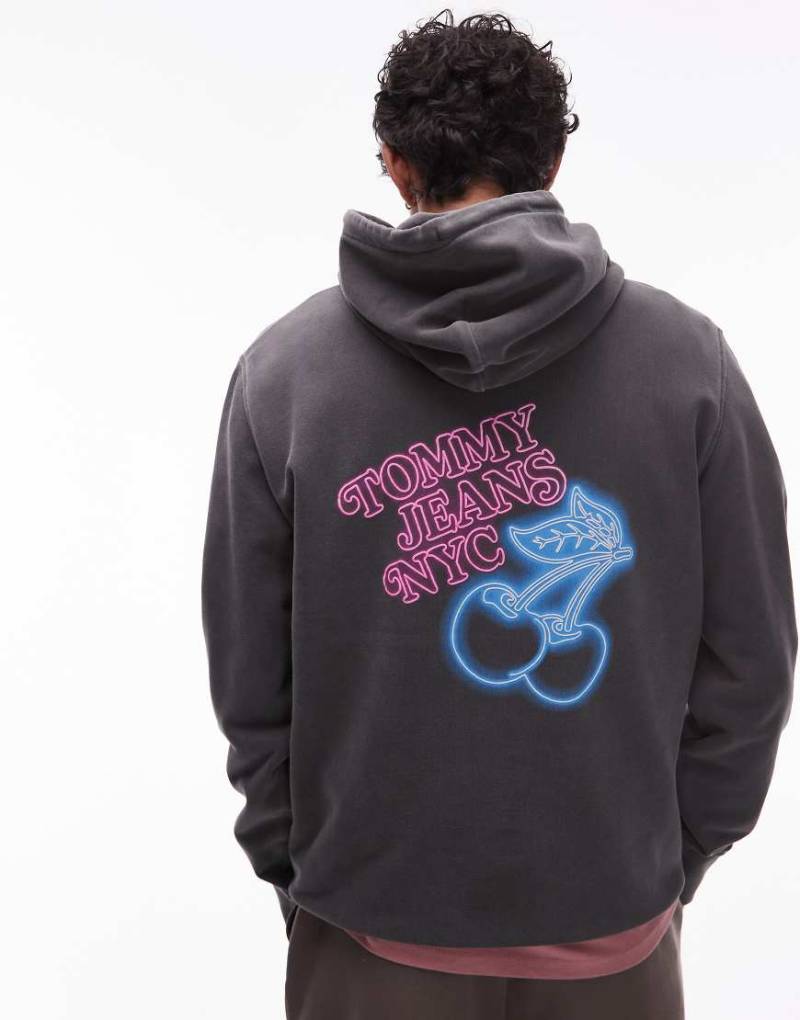 Tommy Jeans - Kapuzenpullover in Schwarz mit Kirschen-Neonlicht-Print von Tommy Jeans
