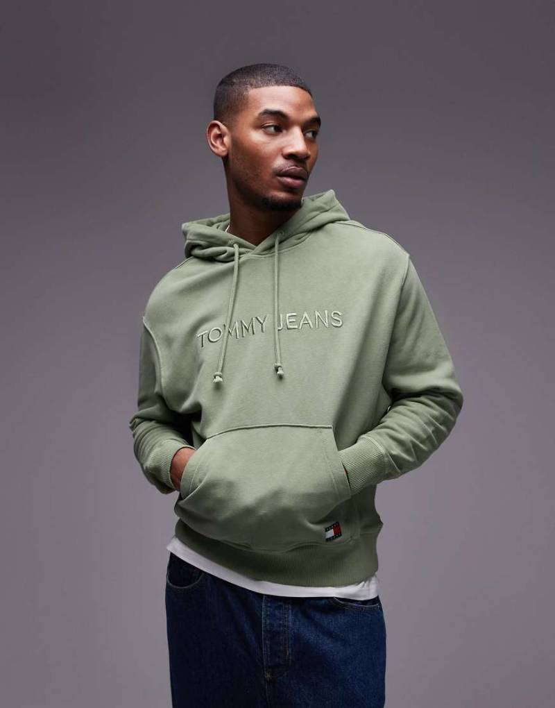 Tommy Jeans - Kapuzenpullover in verwaschenem Grün mit tonalem Logo von Tommy Jeans