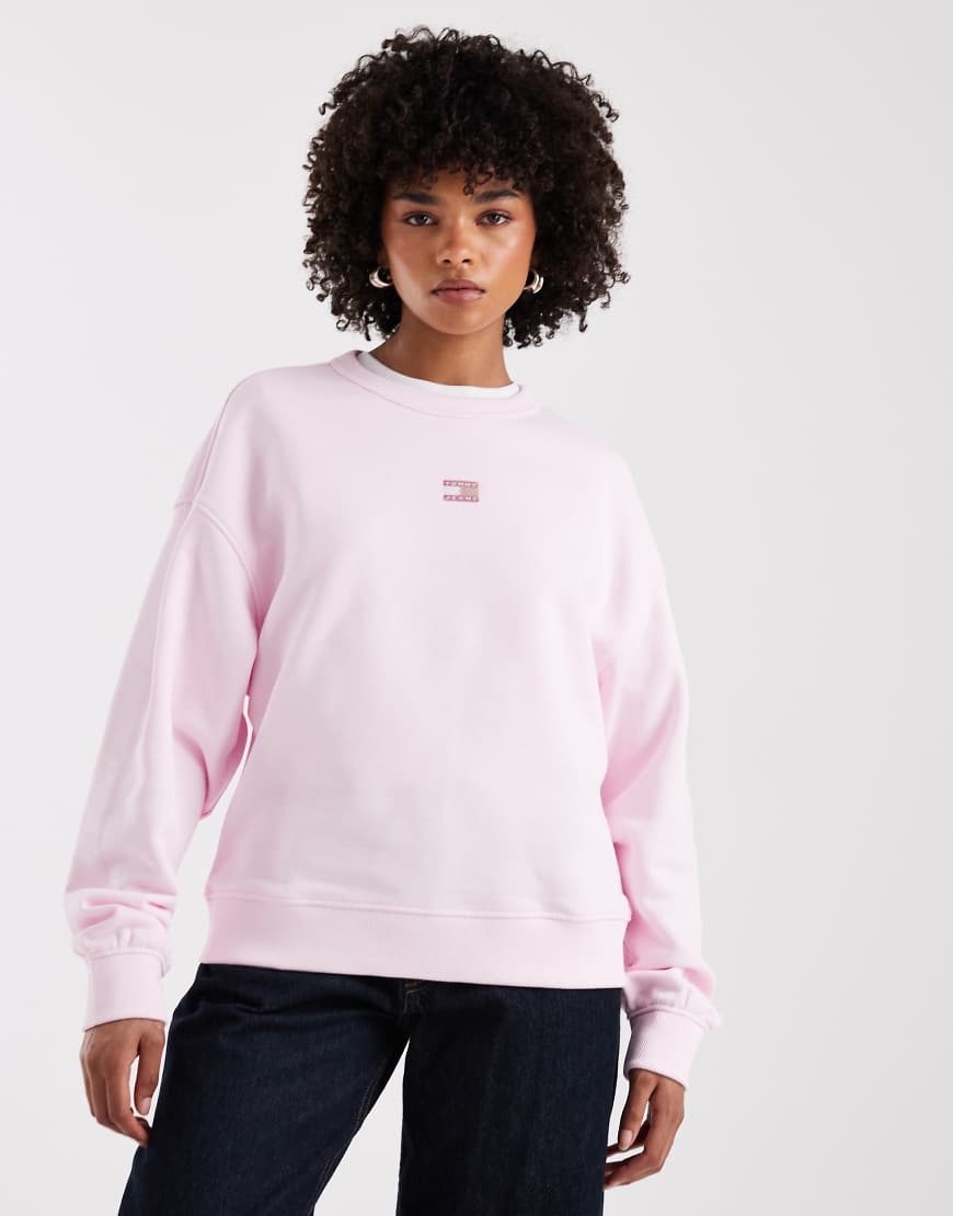 Tommy Jeans - Kastiges Sweatshirt in Rosa mit Aufnäher von Tommy Jeans