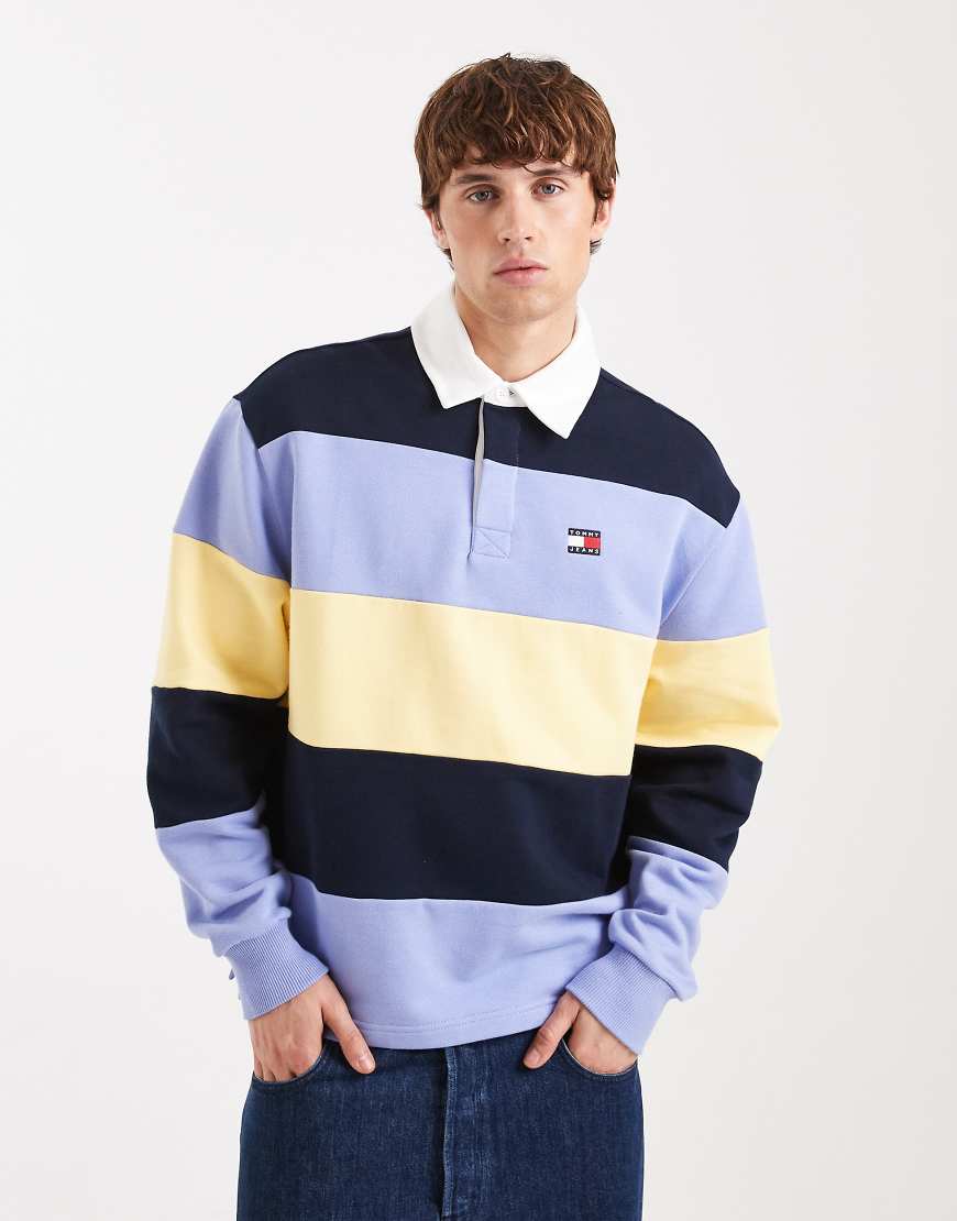 Tommy Jeans - Locker geschnittenes Rugby-Sweatshirt in Marineblau/Flieder/Gelb gestreift von Tommy Jeans