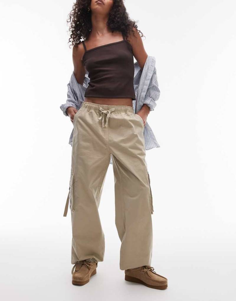 Tommy Jeans - Lockere Cargohose in Schwarz-Braun Tommy Jeans - Lockere Cargohose in Schwarz-Braun von Tommy Jeans