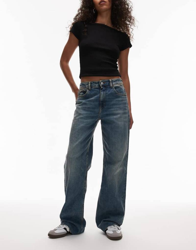 Tommy Jeans - Mia - Locker geschnittene, gerade Jeans in mittlerer Waschung mit mittelhohem Bund-Blau Tommy Jeans - Mia - Locker geschnittene, gerade Jeans in mittlerer Waschung mit mittelhohem Bund-Blau von Tommy Jeans