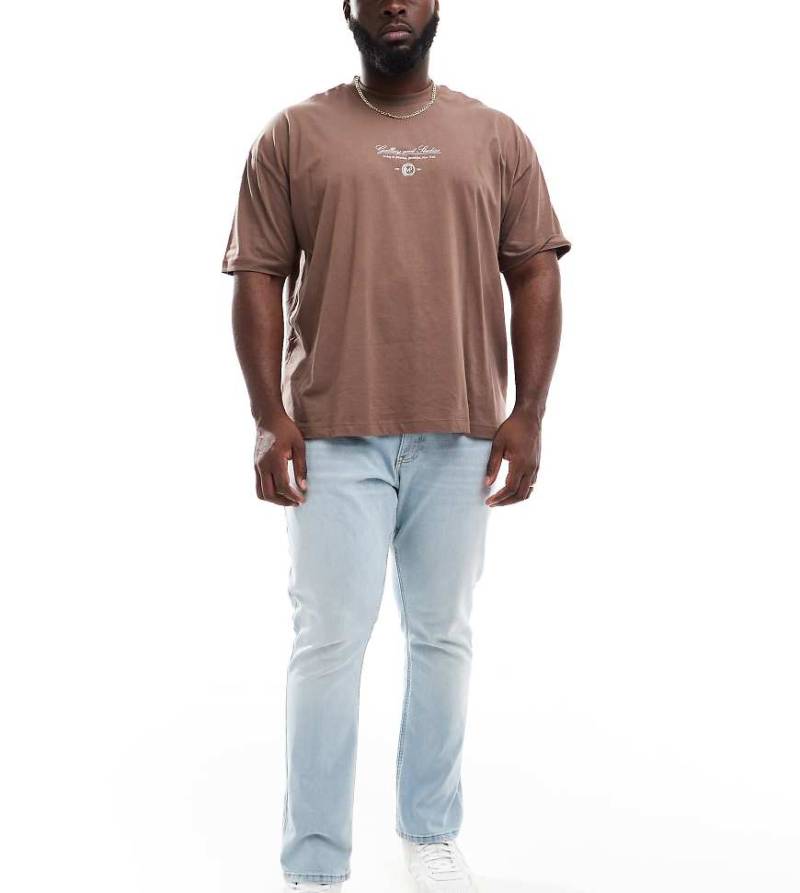 Tommy Jeans Plus - Austin - Schmal zulaufende Jeans in heller Waschung-Blau von Tommy Jeans