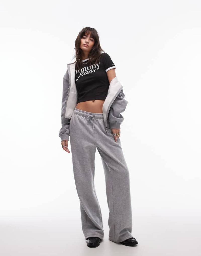 Tommy Jeans - Ringer-T-Shirt in Schwarz mit Schriftzug in Weiß von Tommy Jeans