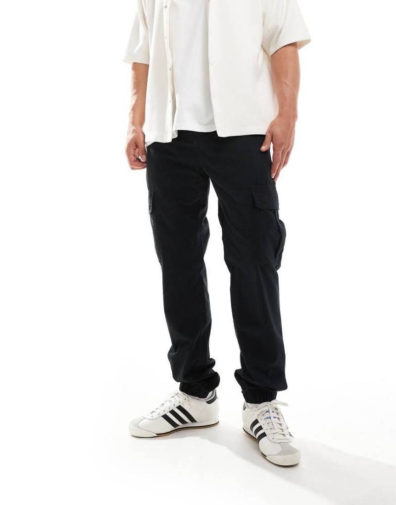 Tommy Jeans - Ryan - Cargohose aus Ripstop in Schwarz von Tommy Jeans
