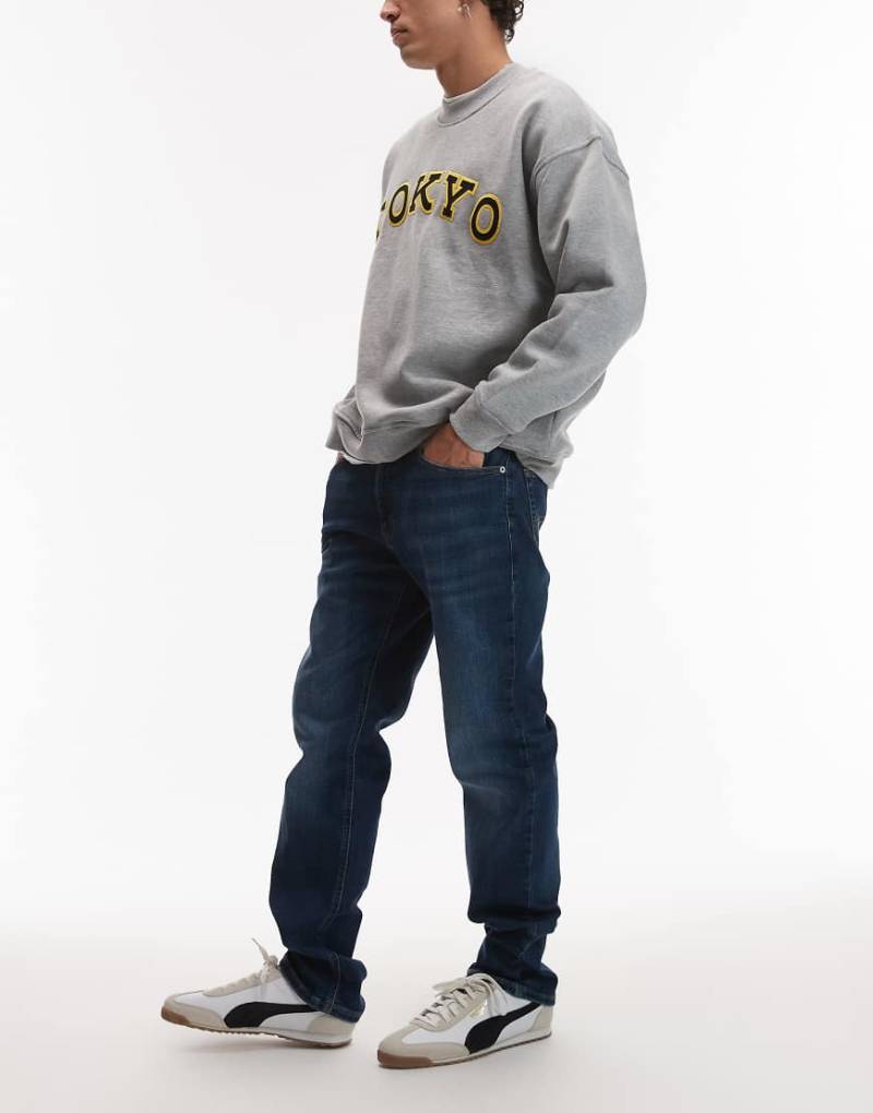 Tommy Jeans - Ryan - Straight Jeans in Dunkelblau mit schmalem Schnitt von Tommy Jeans