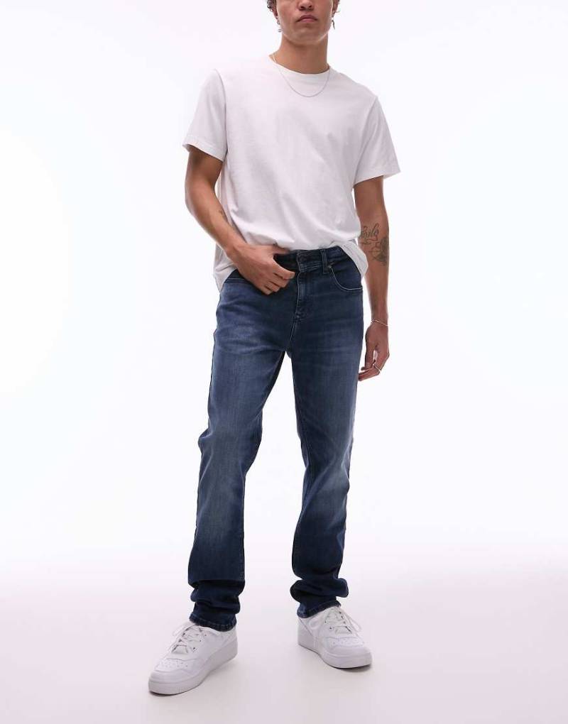 Tommy Jeans - Scanton - Schmal geschnittene Jeans in dunkler Waschung-Blau von Tommy Jeans