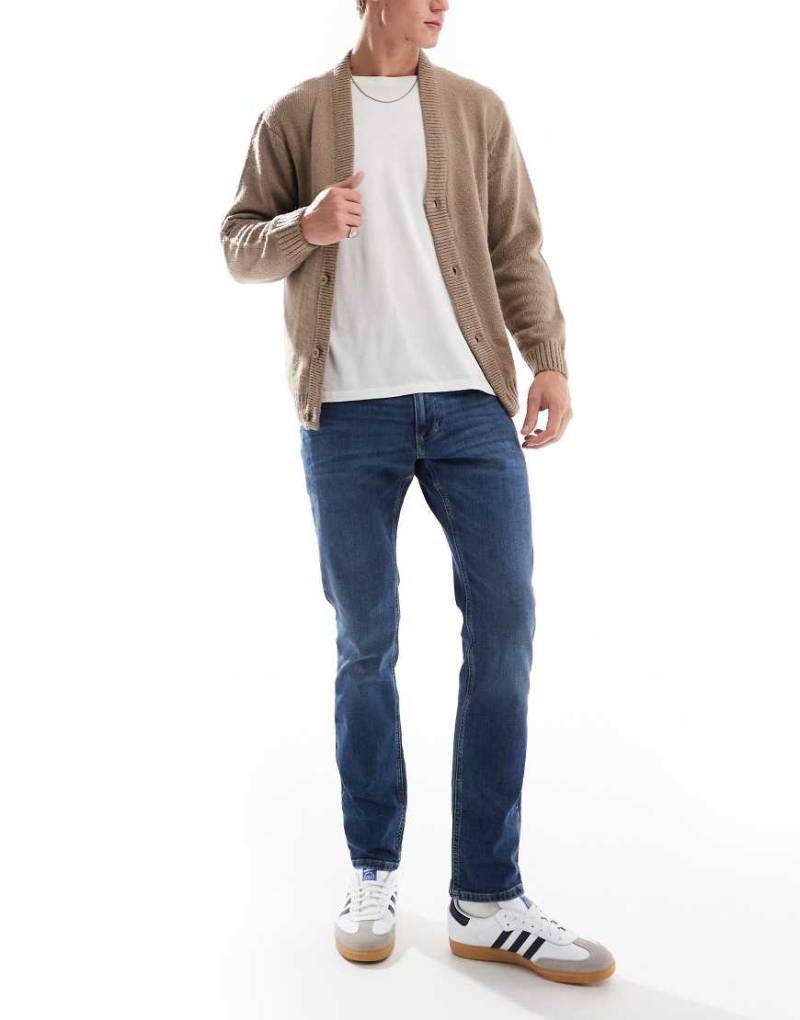 Tommy Jeans - Scanton - Schmal geschnittene Jeans in dunkler Waschung-Marineblau von Tommy Jeans