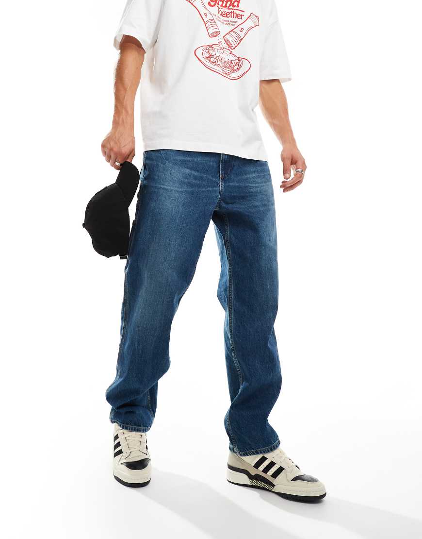 Tommy Jeans - Skater-Jeans im Zimmermann-Stil aus dunklem Jeansstoff-Marineblau von Tommy Jeans