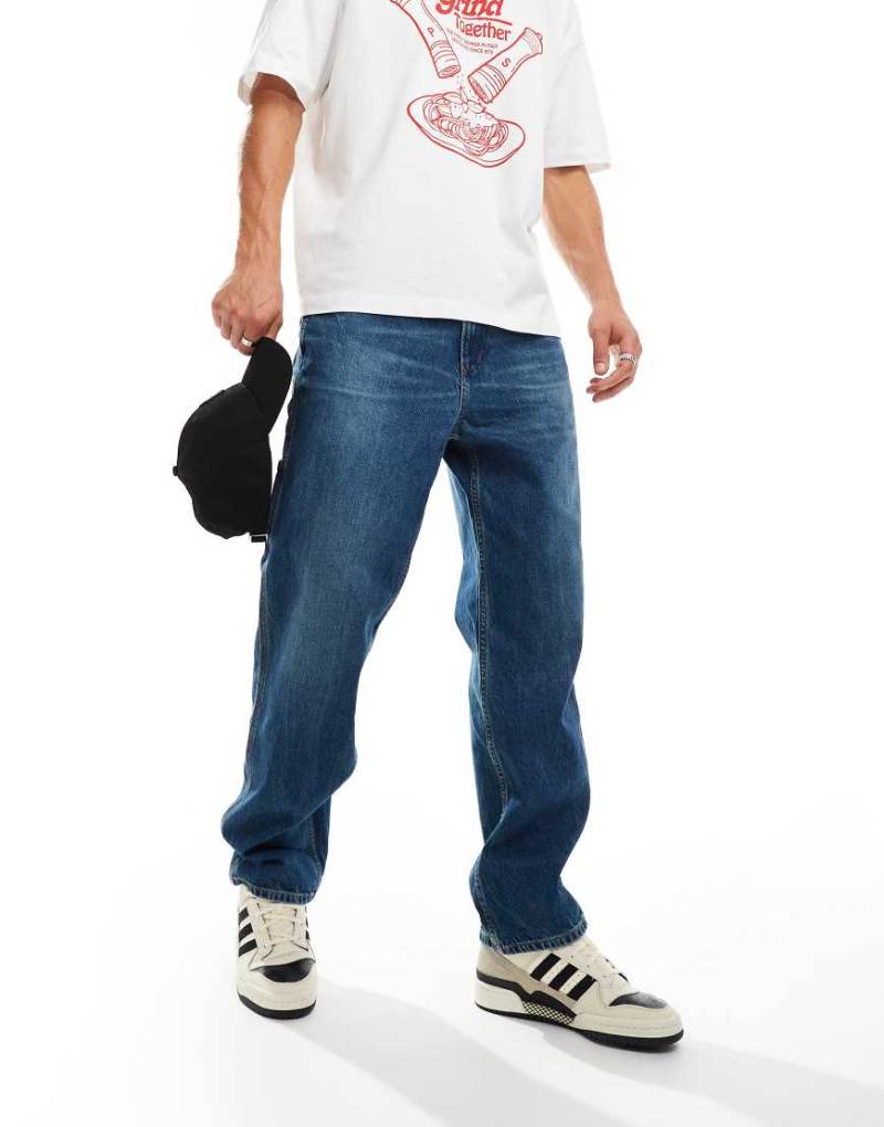 Tommy Jeans - Skater-Jeans im Zimmermann-Stil aus dunklem Jeansstoff-Marineblau von Tommy Jeans