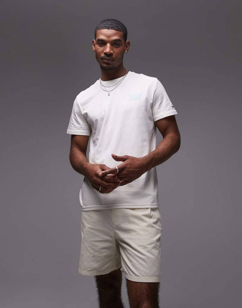 Tommy Jeans - T-Shirt in Weiß und Babyblau mit Bubble-Logo Tommy Jeans - T-Shirt in Weiß und Babyblau mit Bubble-Logo von Tommy Jeans