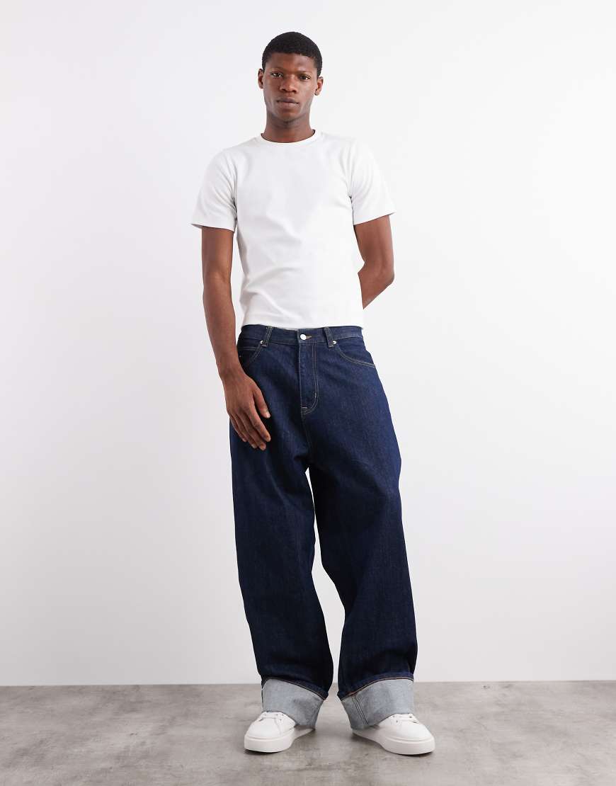 Tommy Jeans - Theo - Baggy Jeans in dunkler Waschung mit Umschlag-Design-Blau von Tommy Jeans
