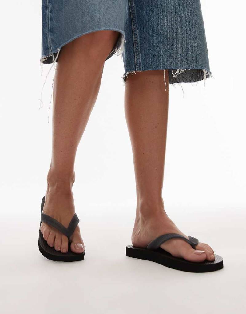 Tommy Jeans - Zehenstegsandalen in Schwarz mit Logo von Tommy Jeans