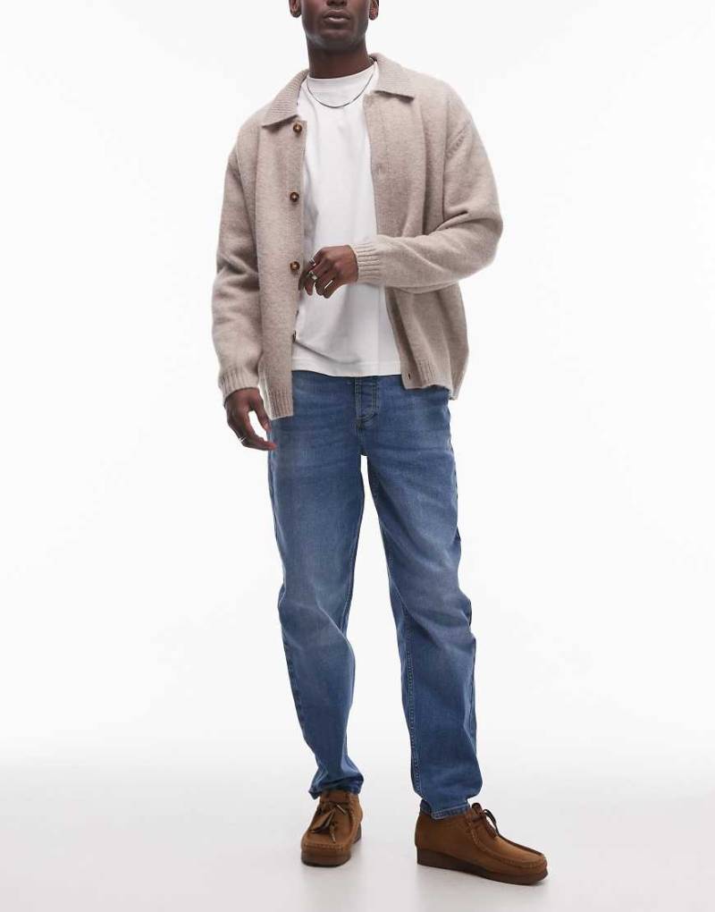 Topman - Elastische, schmal zulaufende Jeans in mittelblauer Waschung von Topman