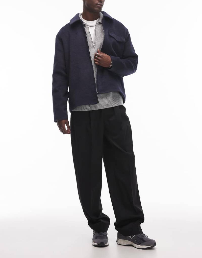 Topman - Elastische Hose in Schwarz mit weitem Bein und elastischem Taillenbund mit Bindedetail Topman - Elastische Hose in Schwarz mit weitem Bein und elastischem Taillenbund mit Bindedetail von Topman