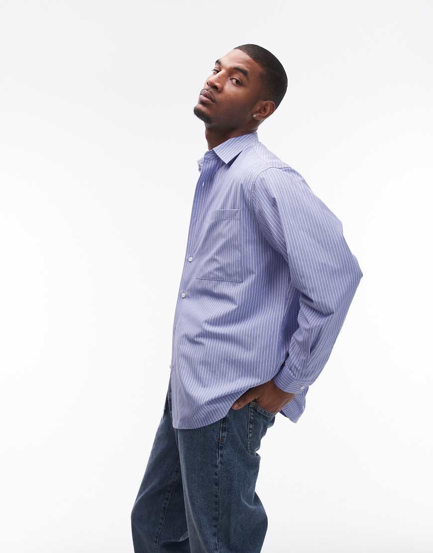 Topman - Elegantes, langärmliges Oversize-Hemd in gestreiftem Hellblau Topman - Elegantes, langärmliges Oversize-Hemd in gestreiftem Hellblau von Topman