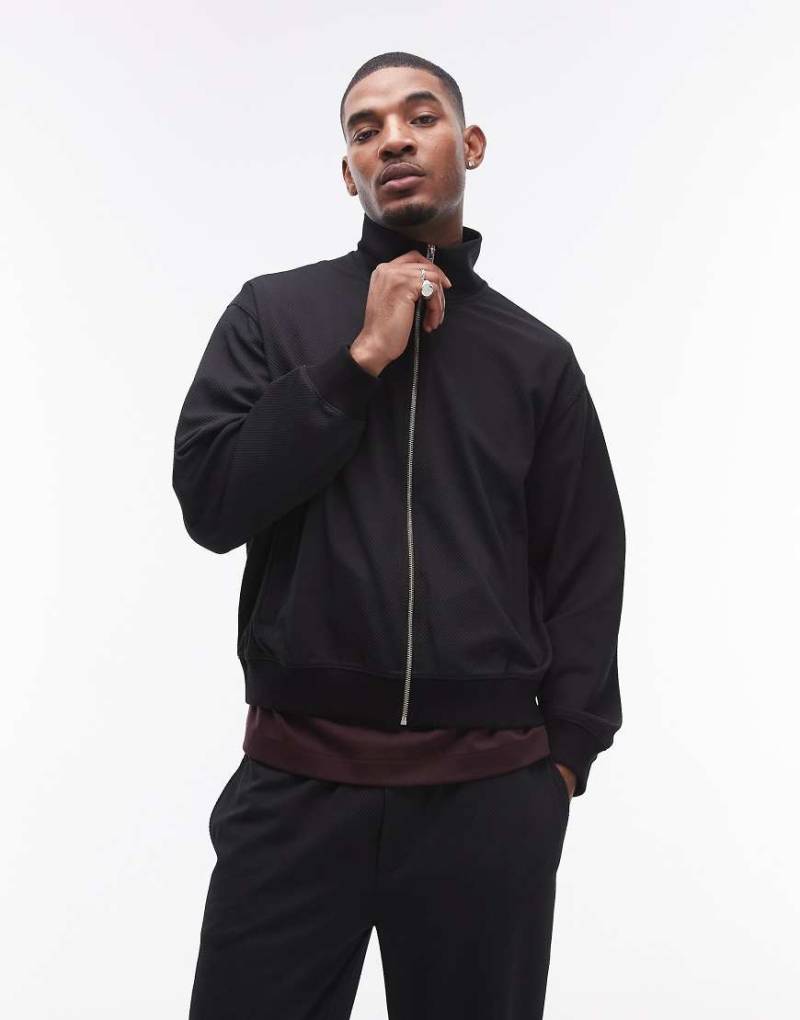 Topman - Jacke in Schwarz mit durchgehendem Reißverschluss und Micro-Waffelstruktur von Topman
