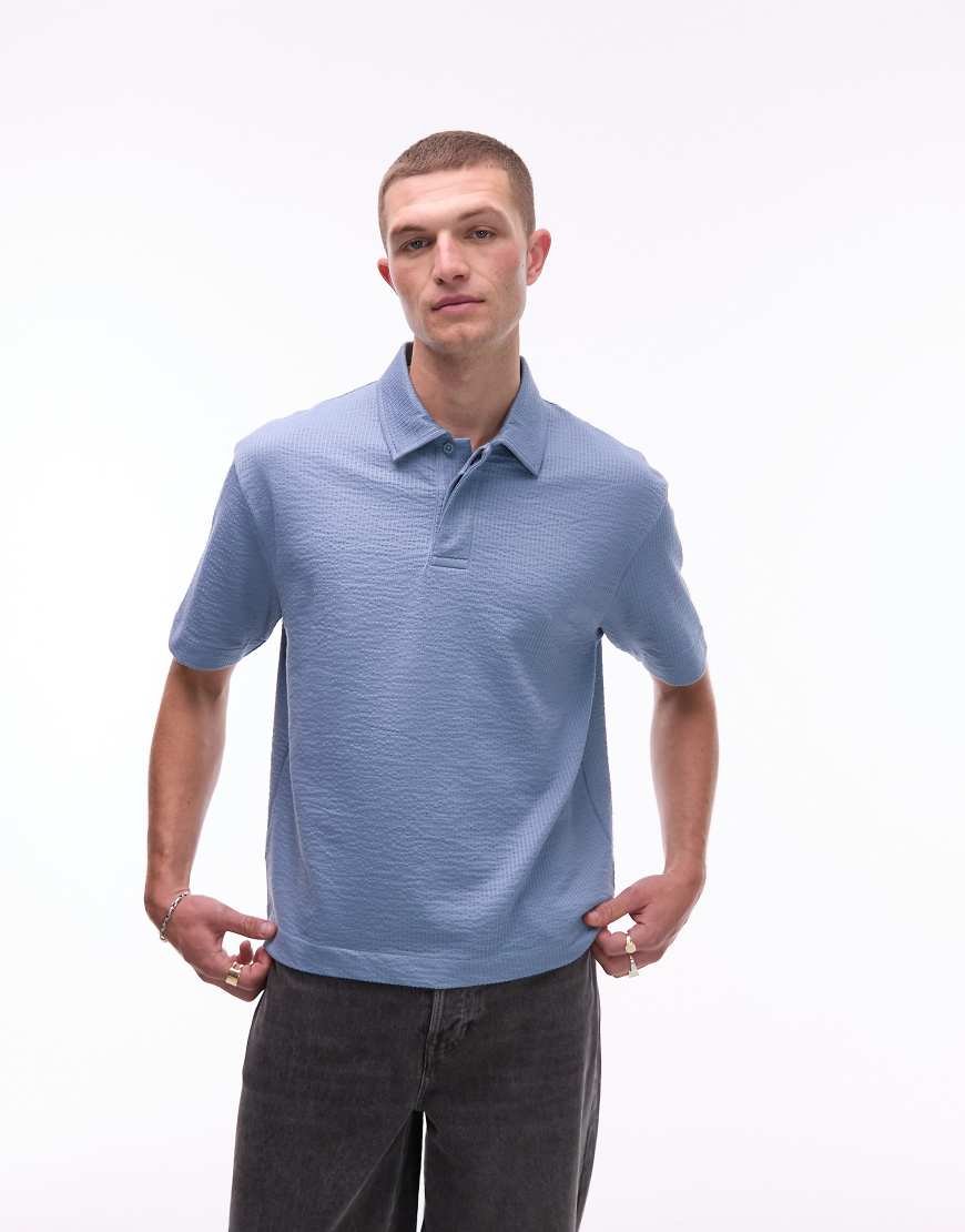 Topman - Cropped Fit Oversize-Polohemd aus Seersucker in gestreiftem Blau Topman - Cropped Fit Oversize-Polohemd aus Seersucker in gestreiftem Blau von Topman