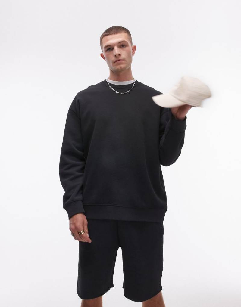 Topman - Oversize-Sweatshirt in verwaschenem Schwarz-Blau von Topman