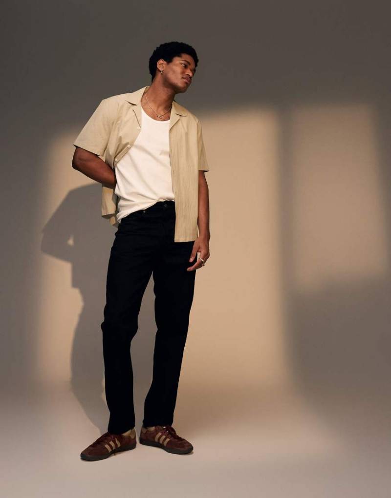 Topman - Schmal zulaufende, feste Jeans in Schwarz von Topman