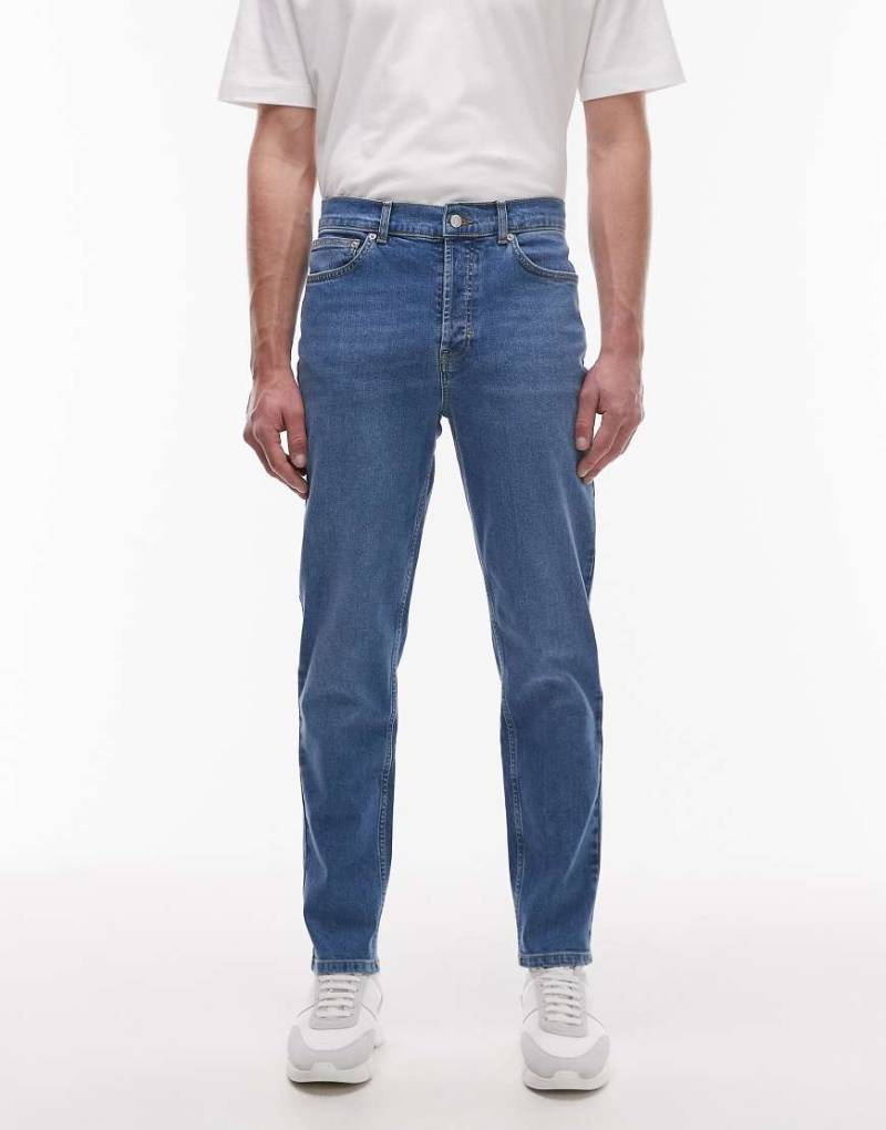 Topman - Schmal zulaufende Stretch-Jeans in mittelblauer Waschung von Topman