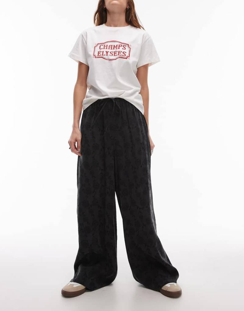 Topshop - Hose in Schwarz mit Jacquard-Blumenmuster und Tunnelzug Topshop - Hose in Schwarz mit Jacquard-Blumenmuster und Tunnelzug von Topshop