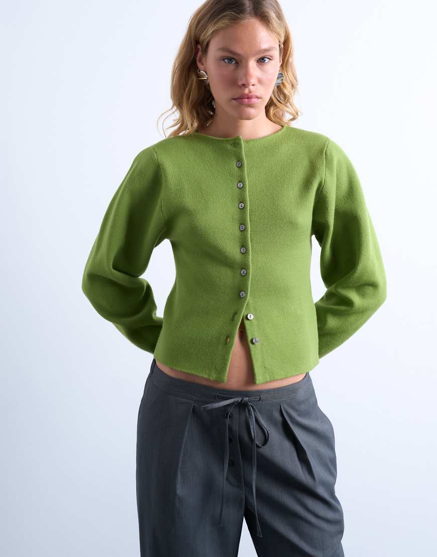 Topshop - Kompakte Strickjacke in Grün mit Ballonärmeln Topshop - Kompakte Strickjacke in Grün mit Ballonärmeln von Topshop